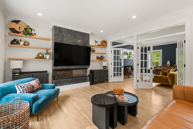 26 Hunting Ridge Rd, Brookfield, CT 06804 - living area with french doors, crown molding, wood finished floors, a large fireplace, and recessed lighting