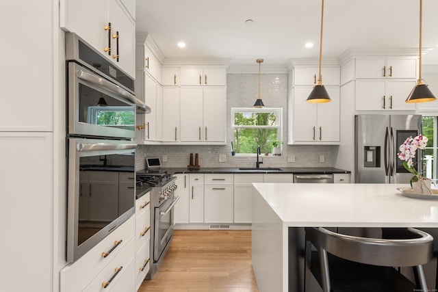 26 Hunting Ridge Rd, Brookfield, CT 06804 - kitchen with stainless steel appliances, a sink, tasteful backsplash, white cabinets, and recessed lighting