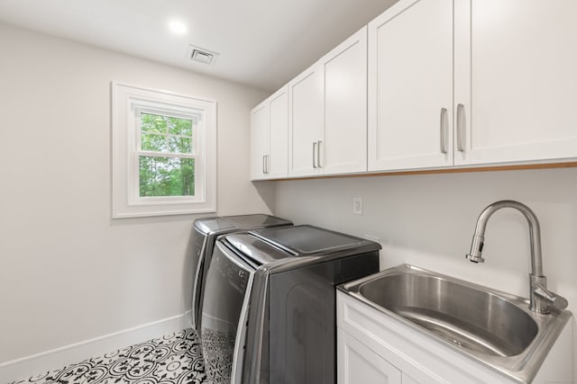 26 Hunting Ridge Rd, Brookfield, CT 06804 - laundry area featuring cabinet space, washer and dryer, baseboards, and tile patterned flooring