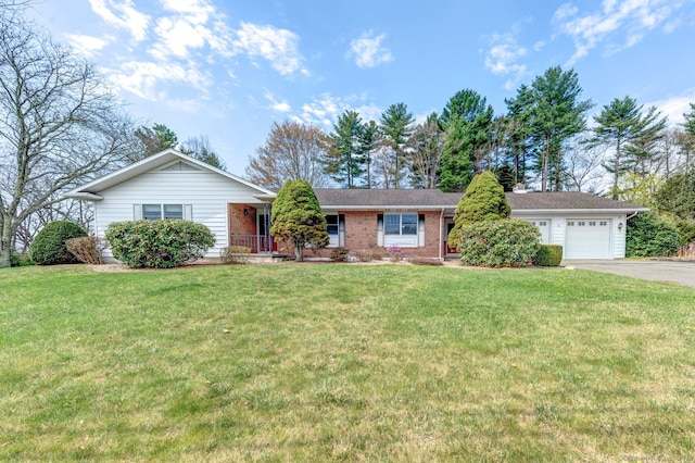 3 Clear View Dr, Mansfield, CT 06250 - ranch-style home featuring driveway, a garage, a front lawn, and brick siding