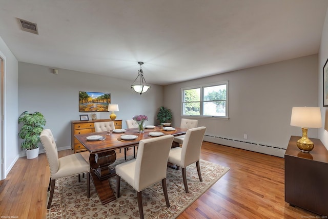 3 Clear View Dr, Mansfield, CT 06250 - dining space featuring a baseboard radiator, light wood-style flooring, and baseboards