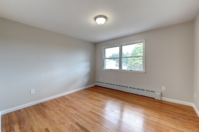 3 Clear View Dr, Mansfield, CT 06250 - unfurnished room with a baseboard radiator, light wood-style floors, and baseboards
