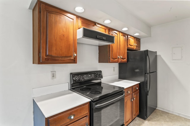50 Aiken St Apt 465, Norwalk, CT 06851 - kitchen with black appliances, exhaust hood, light countertops, brown cabinets, and recessed lighting