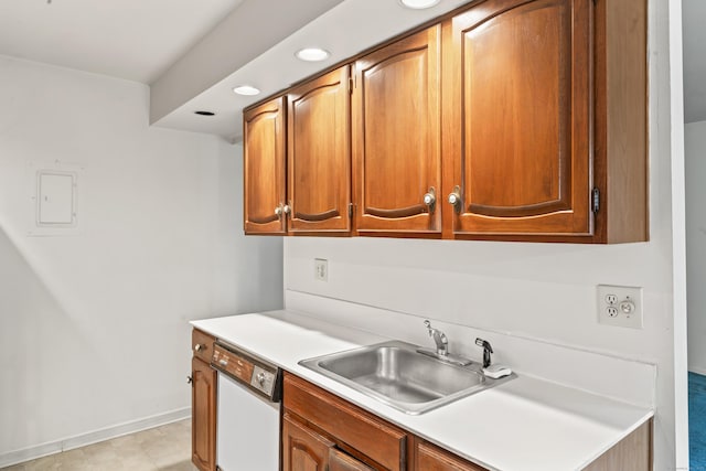 50 Aiken St Apt 465, Norwalk, CT 06851 - kitchen featuring white dishwasher, light countertops, a sink, recessed lighting, and brown cabinetry