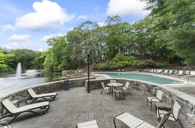 50 Aiken St Apt 465, Norwalk, CT 06851 - community pool with a patio, a water view, and view of scattered trees