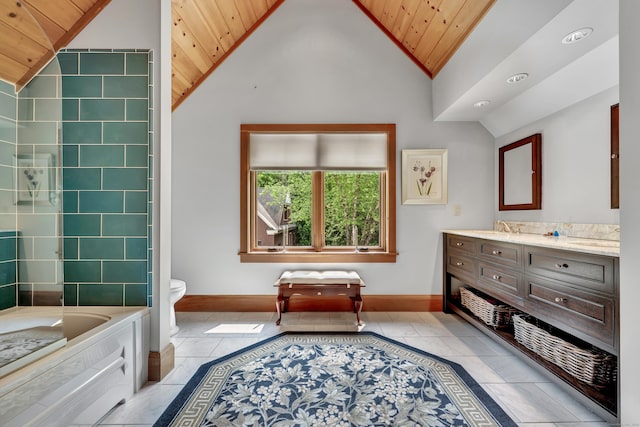 218 Kuhne Rd, Southbury, CT 06488 - full bathroom with wooden ceiling, vaulted ceiling, double vanity, a tub, and toilet