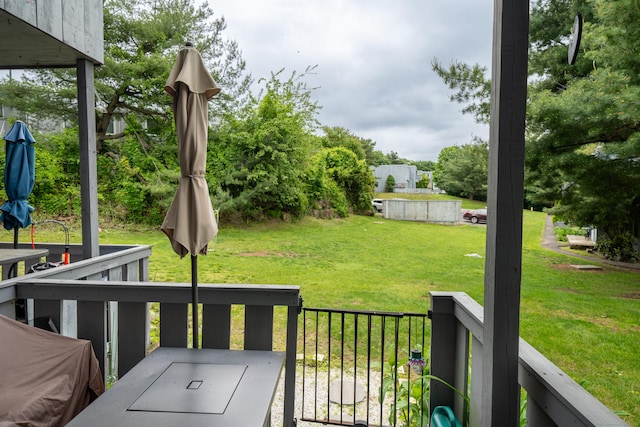183 Thompson St Unit B, East Haven, CT 06513 - wooden terrace with a lawn