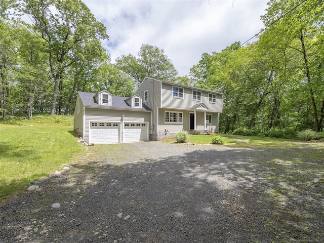34 Powder Horn Hill Rd, Wilton, CT 06897 - colonial house featuring a front yard, a garage, and driveway