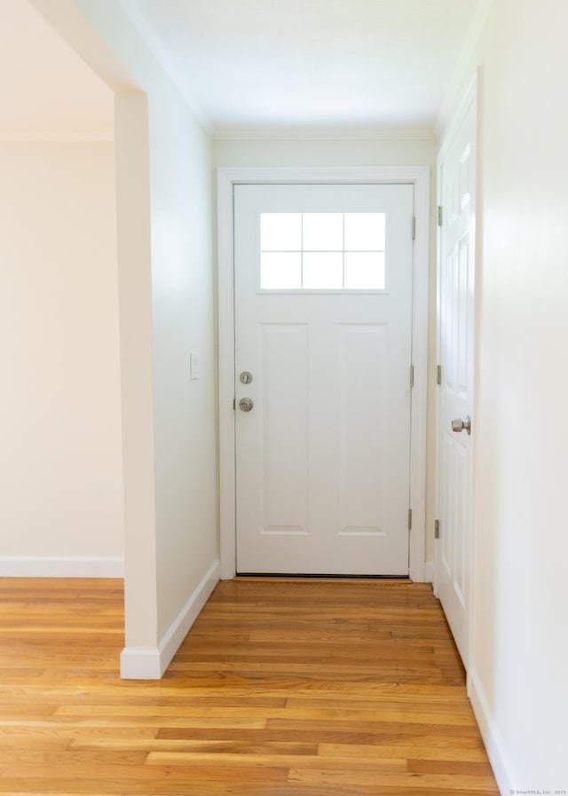 38 Dinwoodie Dr, North Branford, CT 06471 - doorway to outside featuring light wood-type flooring, baseboards, and ornamental molding