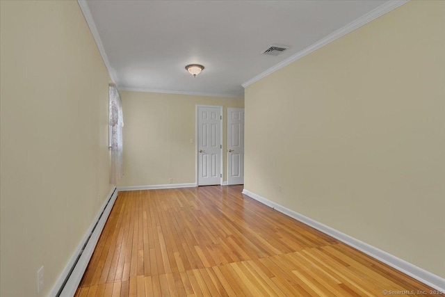 166 Mine Rd, Bristol, CT 06010 - empty room with a baseboard radiator, light wood finished floors, ornamental molding, and baseboards