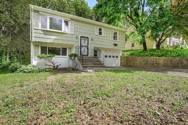 9 Marlin Dr, Norwalk, CT 06854 - split foyer home with a garage and a front yard