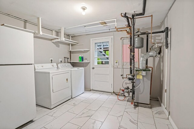9 Marlin Dr, Norwalk, CT 06854 - laundry area with washing machine and dryer and light marble finish floors