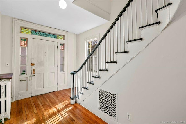 8 Academy St, New Haven, CT 06511 - entrance foyer with hardwood / wood-style floors and stairway
