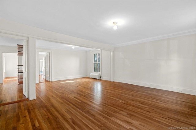 8 Academy St, New Haven, CT 06511 - unfurnished room with ornamental molding, radiator, wood finished floors, and baseboards
