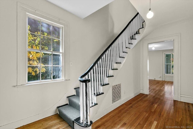 8 Academy St, New Haven, CT 06511 - staircase with hardwood / wood-style floors and baseboards