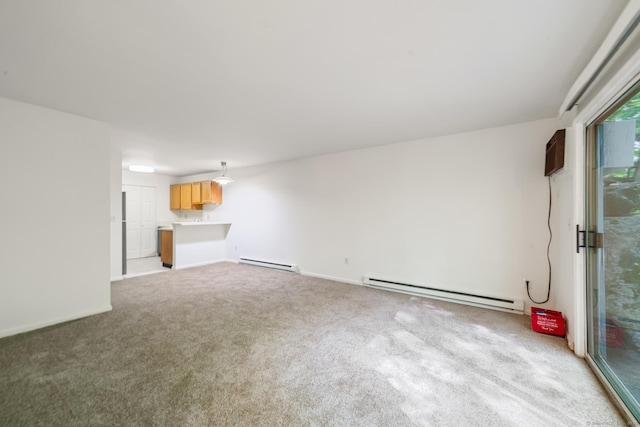 20 E Pembroke Rd Unit 55, Danbury, CT 06811 - unfurnished living room with a baseboard heating unit, light carpet, and baseboards