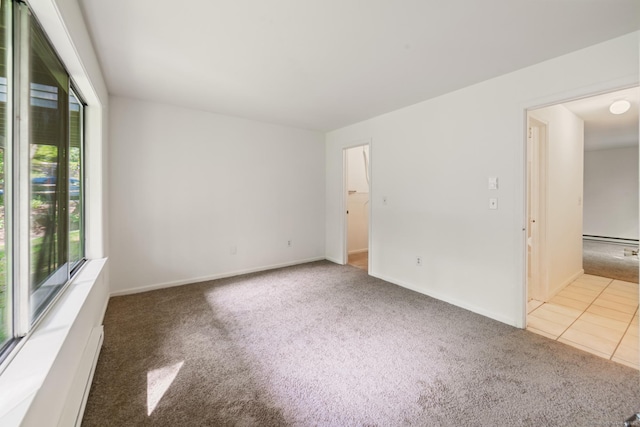 20 E Pembroke Rd Unit 55, Danbury, CT 06811 - carpeted empty room with baseboard heating and baseboards