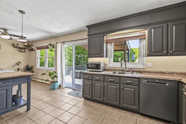 96 Flanders River Rd, Coventry, CT 06238 - kitchen with stainless steel appliances, a sink, a baseboard heating unit, a textured ceiling, and light tile patterned floors