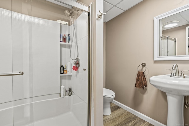 96 Flanders River Rd, Coventry, CT 06238 - bathroom with a shower stall, wood finished floors, toilet, and baseboards