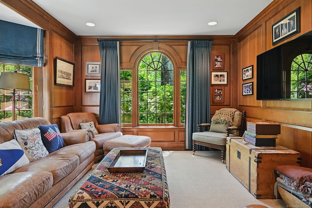 276 Greenley Rd, New Canaan, CT 06840 - carpeted living area featuring crown molding, wooden walls, and recessed lighting