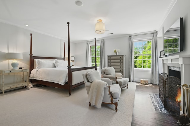 276 Greenley Rd, New Canaan, CT 06840 - bedroom with crown molding, a high end fireplace, wood finished floors, and recessed lighting