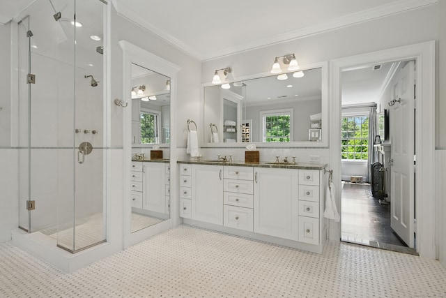 276 Greenley Rd, New Canaan, CT 06840 - bathroom featuring crown molding, a stall shower, double vanity, and ceiling fan