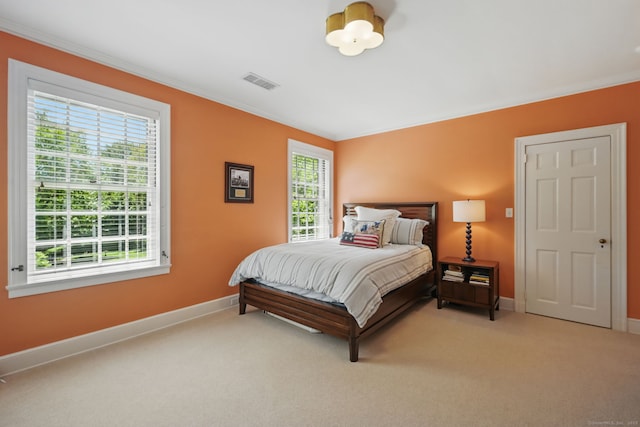 276 Greenley Rd, New Canaan, CT 06840 - carpeted bedroom featuring multiple windows, crown molding, and baseboards