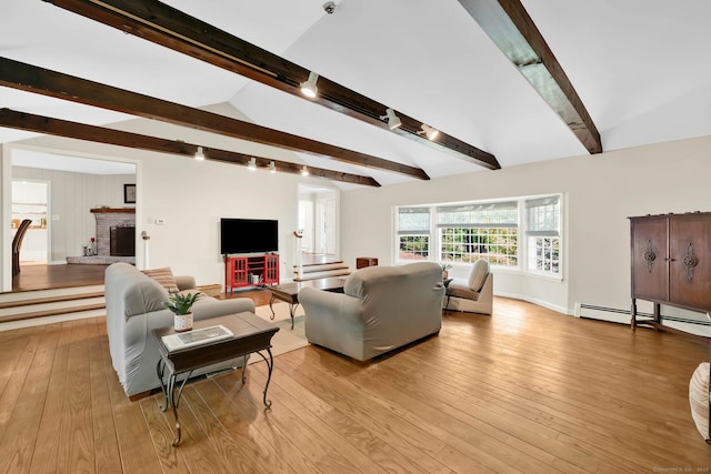 6 Cedar Cir, Newtown, CT 06470 - living room featuring a baseboard radiator, track lighting, light wood-type flooring, a brick fireplace, and baseboards