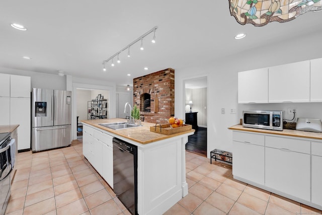 6 Cedar Cir, Newtown, CT 06470 - kitchen featuring appliances with stainless steel finishes, a sink, white cabinets, light countertops, and recessed lighting