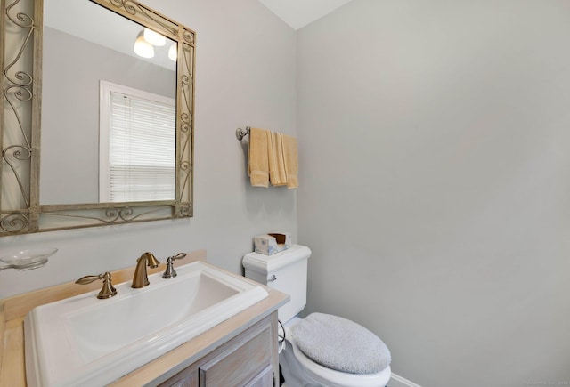 6 Cedar Cir, Newtown, CT 06470 - half bathroom featuring toilet and vanity