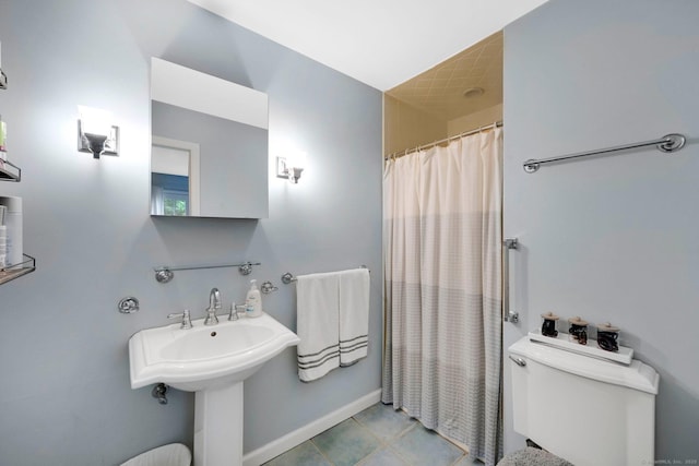 6 Cedar Cir, Newtown, CT 06470 - bathroom with toilet, curtained shower, baseboards, and tile patterned floors