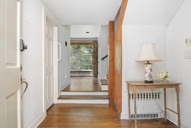 708 Ponus Rdg, New Canaan, CT 06840 - stairway with radiator heating unit, wood finished floors, baseboards, and a baseboard radiator