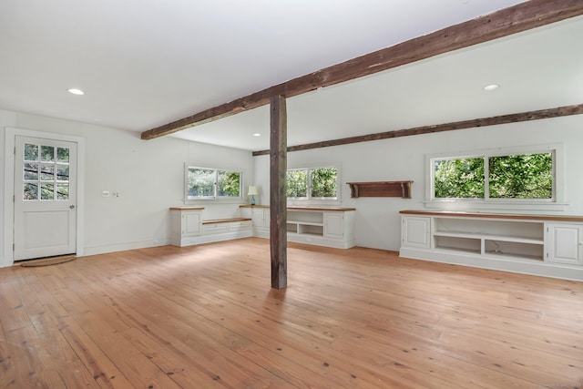 708 Ponus Rdg, New Canaan, CT 06840 - unfurnished living room with beamed ceiling, light wood-type flooring, plenty of natural light, recessed lighting, and baseboards