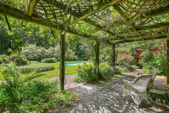 708 Ponus Rdg, New Canaan, CT 06840 - view of patio / terrace with a pergola and an outdoor pool