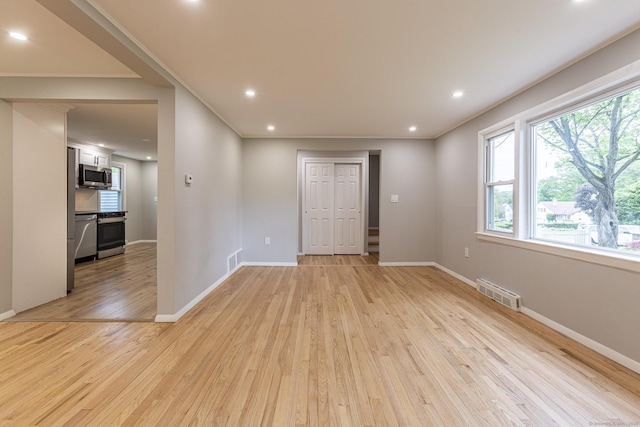 79 Arrowbrook Rd, Windsor, CT 06095 - empty room with light wood-style floors, plenty of natural light, baseboards, and recessed lighting