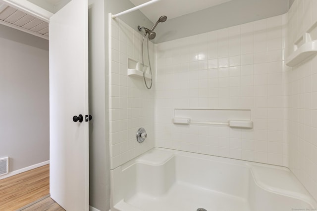 79 Arrowbrook Rd, Windsor, CT 06095 - bathroom featuring a shower, wood finished floors, and baseboards