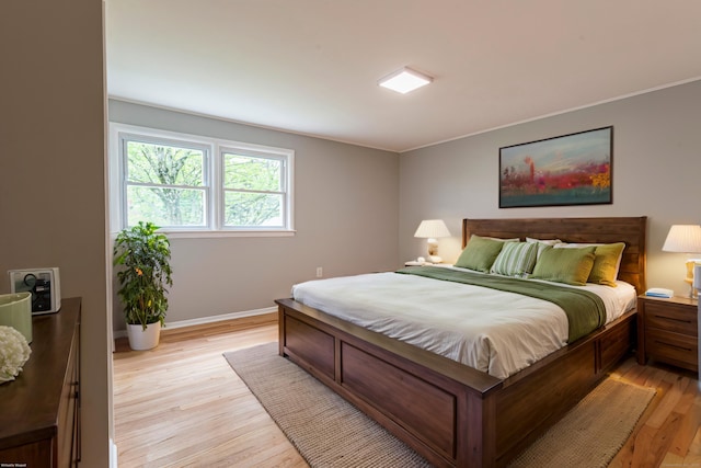 79 Arrowbrook Rd, Windsor, CT 06095 - bedroom featuring light wood-style flooring, baseboards, and ornamental molding