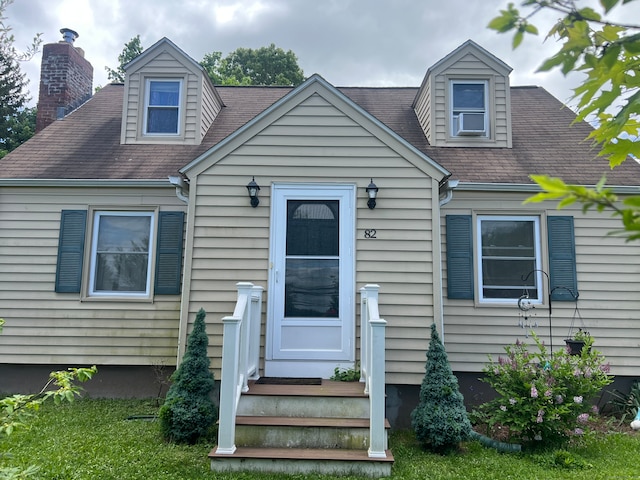 82 Vernon Center Hts, Vernon, CT 06066 - new england style home with a shingled roof and a chimney