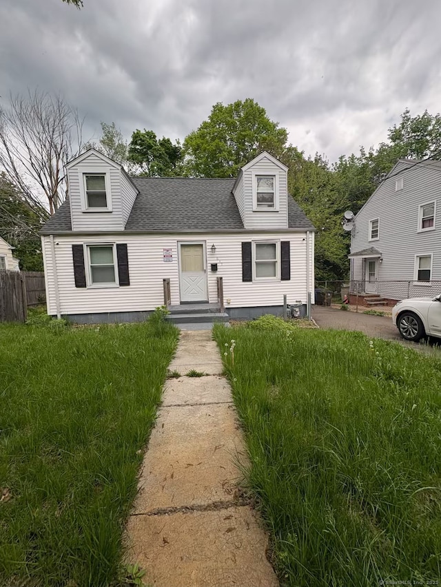 647 Fountain St, New Haven, CT 06515 - new england style home featuring roof with shingles
