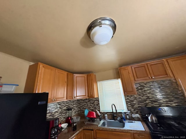 647 Fountain St, New Haven, CT 06515 - kitchen with freestanding refrigerator, range, backsplash, and a sink