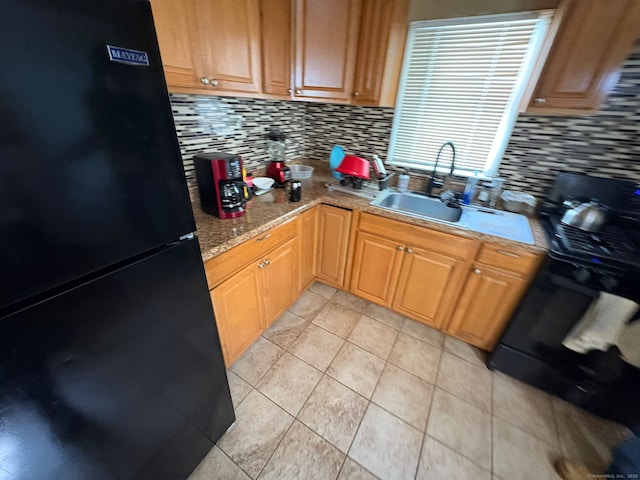 647 Fountain St, New Haven, CT 06515 - kitchen with freestanding refrigerator, backsplash, light tile patterned floors, range, and light stone countertops
