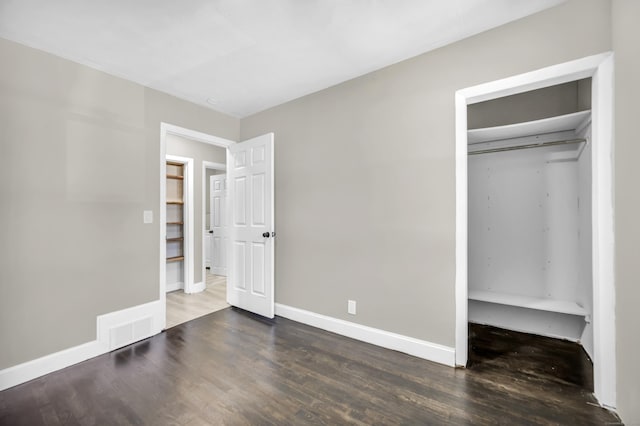 29 Risley St, East Hartford, CT 06118 - unfurnished bedroom featuring wood finished floors, baseboards, and a closet