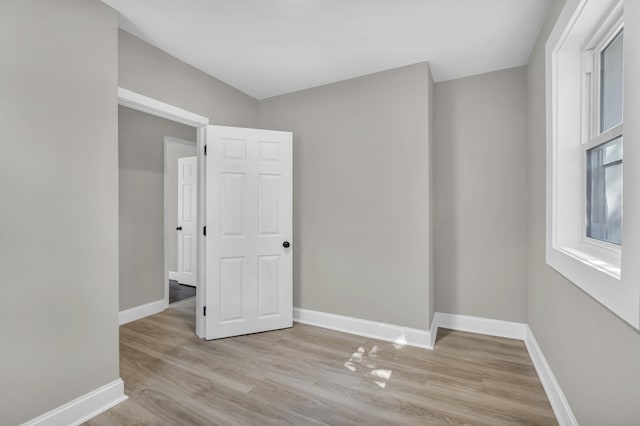 29 Risley St, East Hartford, CT 06118 - empty room featuring light wood finished floors and baseboards