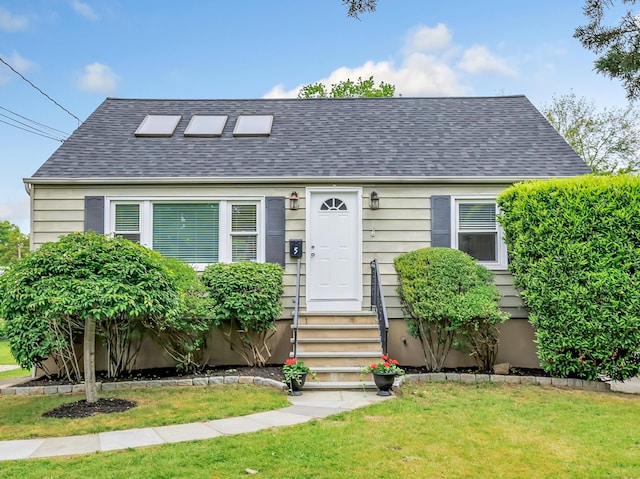 5 Wildmere Ln, Norwalk, CT 06851 - view of front facade featuring roof with shingles and a front lawn