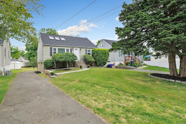 5 Wildmere Ln, Norwalk, CT 06851 - view of front of home with driveway and roof with shingles