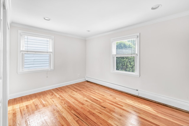 5 Wildmere Ln, Norwalk, CT 06851 - spare room featuring a baseboard radiator, wood finished floors, crown molding, baseboards, and recessed lighting
