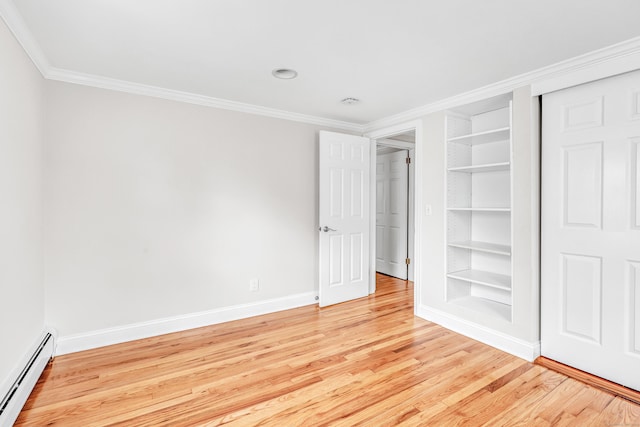 5 Wildmere Ln, Norwalk, CT 06851 - unfurnished bedroom with baseboard heating, light wood-style floors, baseboards, ornamental molding, and a closet