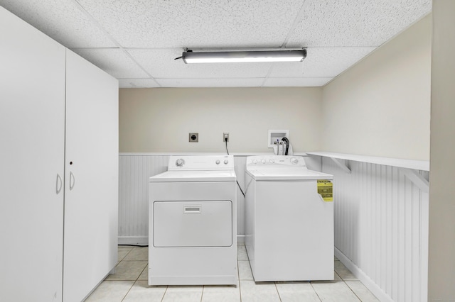 5 Wildmere Ln, Norwalk, CT 06851 - washroom featuring washing machine and dryer, wainscoting, and light tile patterned floors