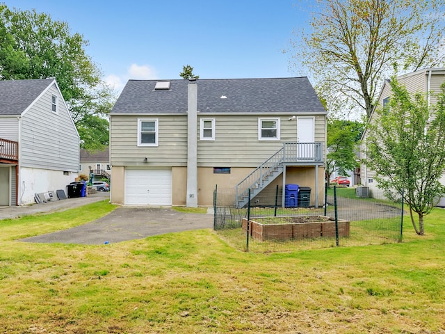 5 Wildmere Ln, Norwalk, CT 06851 - back of house with stairway, a garage, asphalt driveway, and roof with shingles