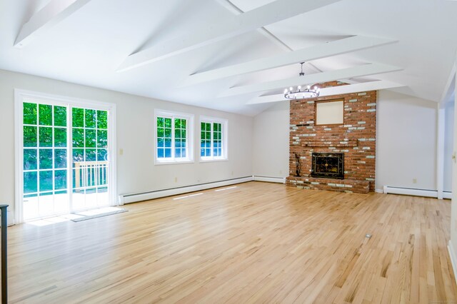 4 Leopard Dr, Newtown, CT 06482 - unfurnished living room with a baseboard radiator, wood finished floors, a baseboard heating unit, a chandelier, and a fireplace